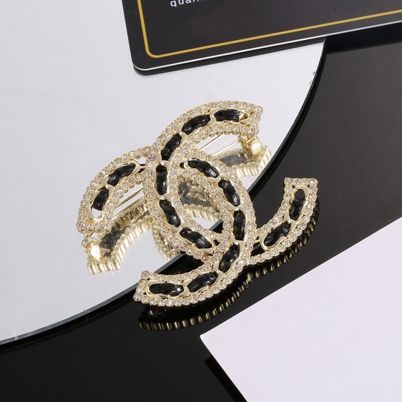 Ch*el brooches